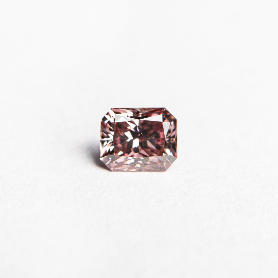 The 0.35ct 4.40x3.60x2.73mm GIA SI1 Fancy Deep Pink Cut Corner Rectangle Brilliant 24155-01 by East London jeweller Rachel Boston | Discover our collections of unique and timeless engagement rings, wedding rings, and modern fine jewellery. - Rachel Boston Jewellery