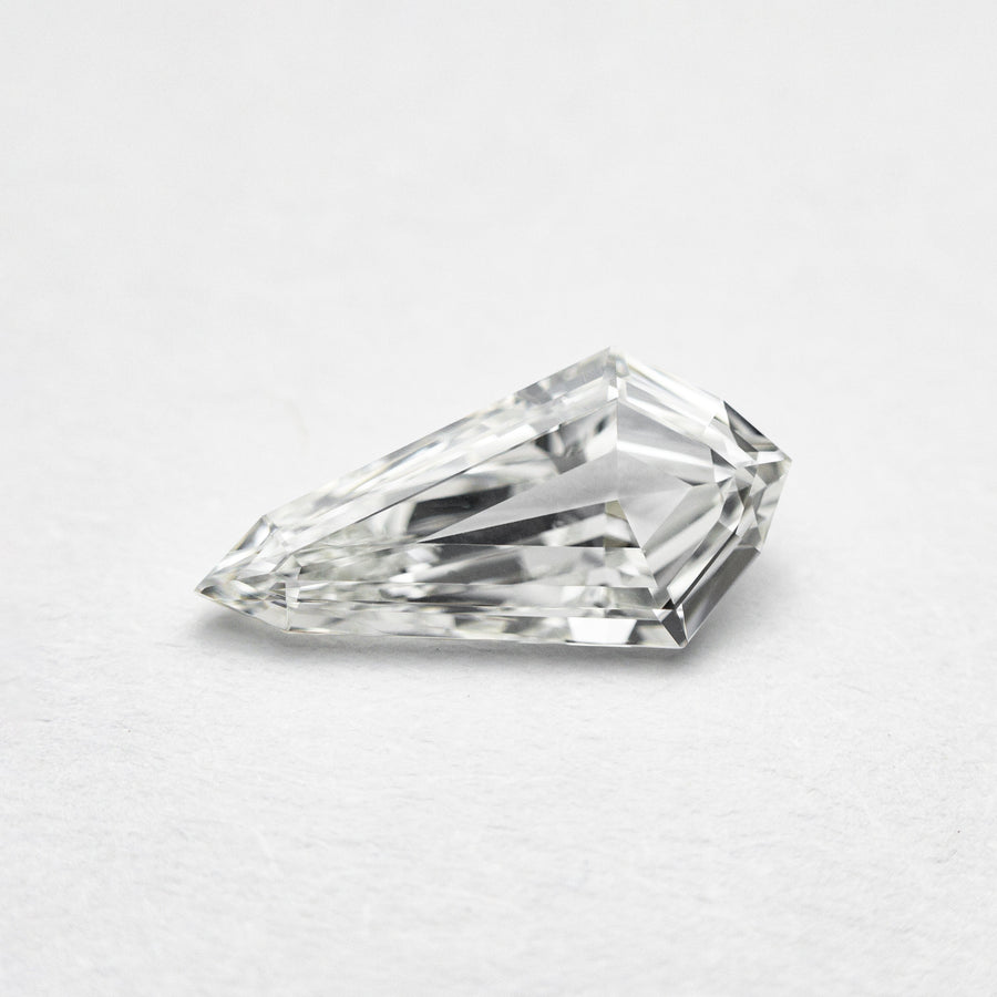 The 0.70ct 10.00x5.10x2.21mm VS2 G Kite Step Cut 21690-05 by East London jeweller Rachel Boston | Discover our collections of unique and timeless engagement rings, wedding rings, and modern fine jewellery. - Rachel Boston Jewellery