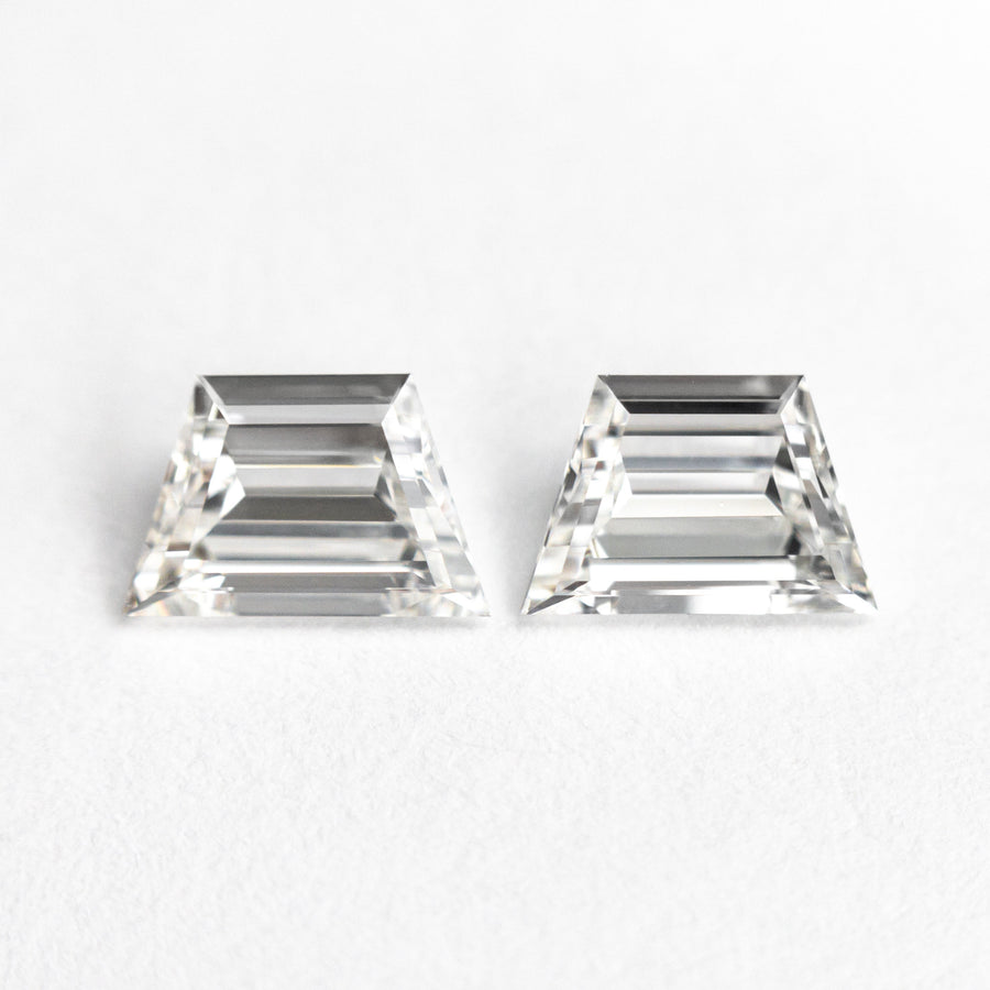 The 1.06cttw 2pc 6.57x4.34x2.33mm 6.45x4.29x2.30mm VVS2 G Trapezoid Step Cut Matching Pair 25535-01 by East London jeweller Rachel Boston | Discover our collections of unique and timeless engagement rings, wedding rings, and modern fine jewellery. - Rachel Boston Jewellery